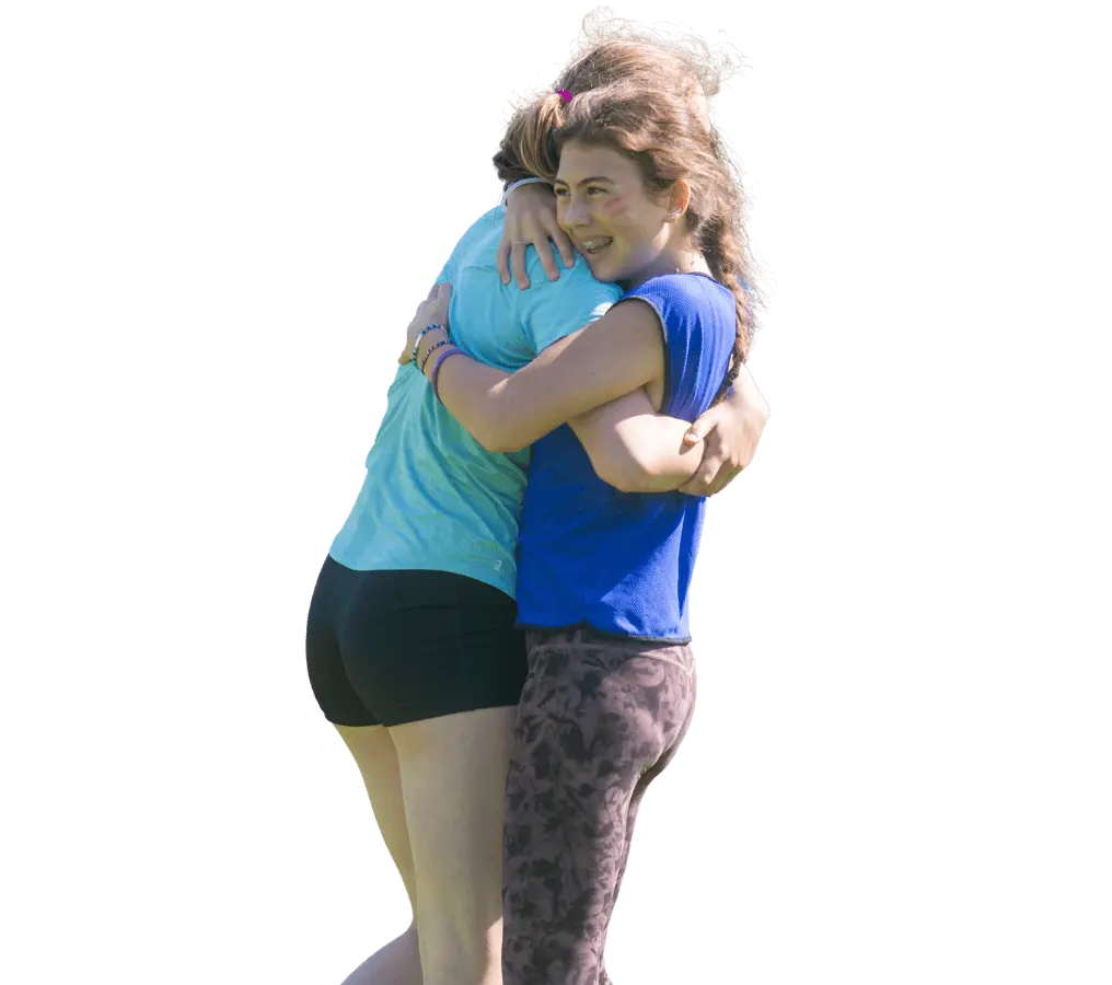 Gordonstoun pupils hugging at an athletics competition