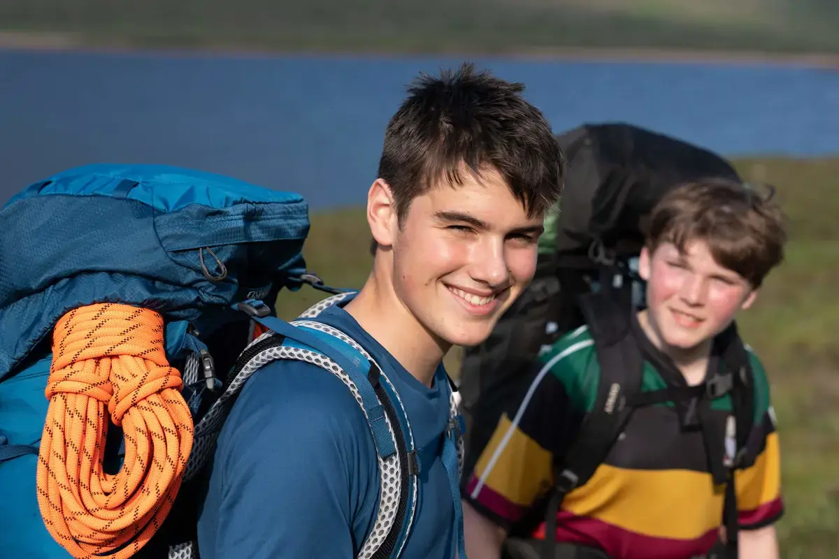 Two Gordonstoun boys out on expedition in the sunshine.